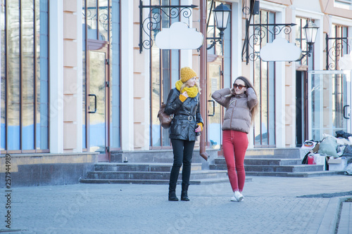 two girls girlfriends walk around the city lifestyle dress © bisonov