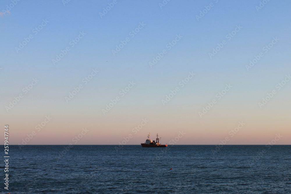 ship at sea, beautiful seascape and sunset