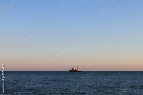 ship at sea, beautiful seascape and sunset © DaNaNi