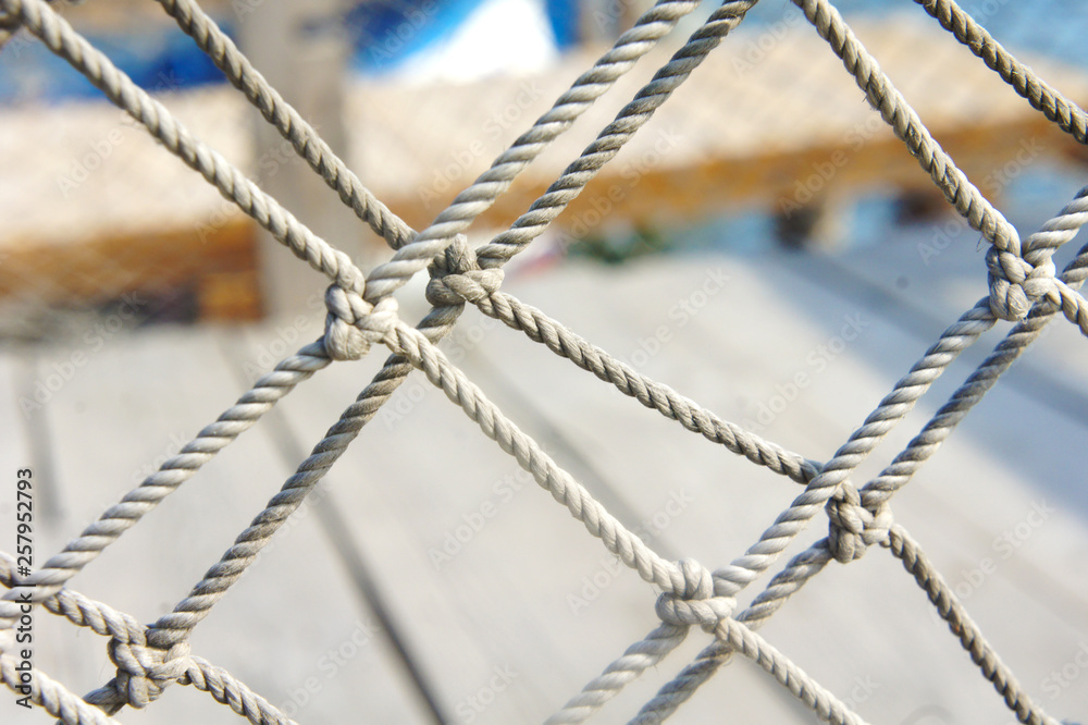 mesh rope. sea rope fence. sea knot close up background