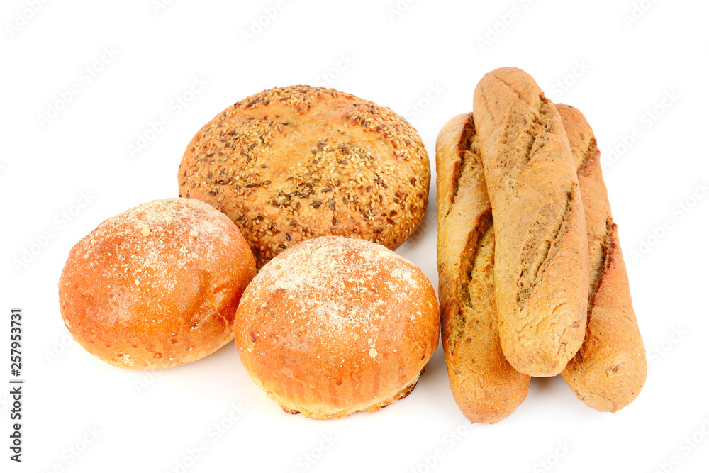 Appetizing grain bread, baguette and buns isolated on white background. Appetizing grain bread, baguette and buns isolated on white background.