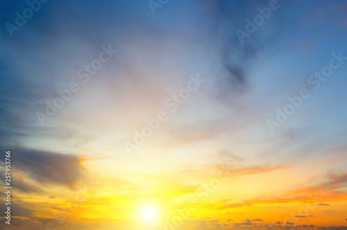Fototapeta Naklejka Na Ścianę i Meble -  Cloudy sky and bright sun rise over the horizon.