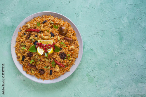 Ramadan food. Vegetarian Kabsa with rice and nuts.