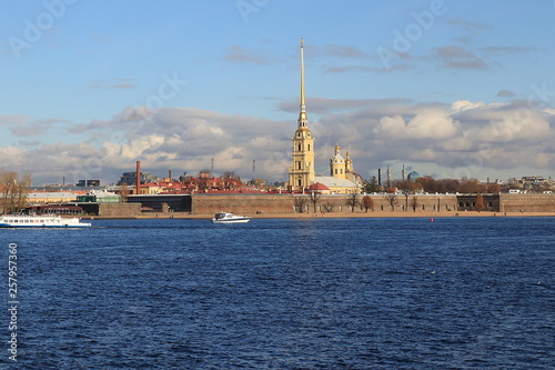 Russia, Petersburg, September 21, 2018, Peter and Paul Fortress. The photo shows the Peter and Paul Fortress and a tourist boat sailing along the Neva River.