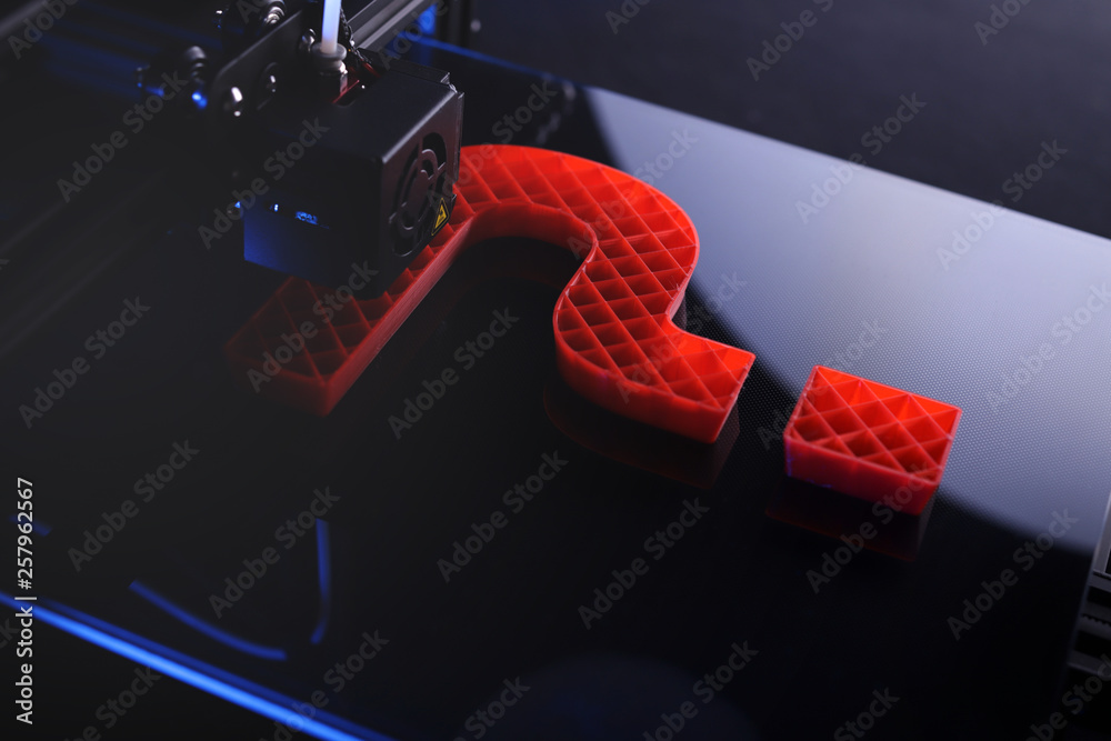 3D-printer producing big sculptural question mark from red plastic in ...