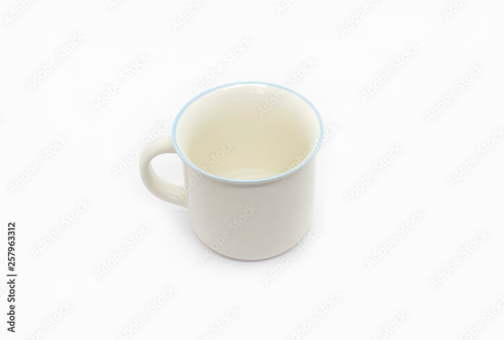 White ceramic cup with handle and blue rim White ceramic cup with handle and blue rim