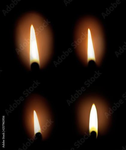 Set of different candle flames on black background