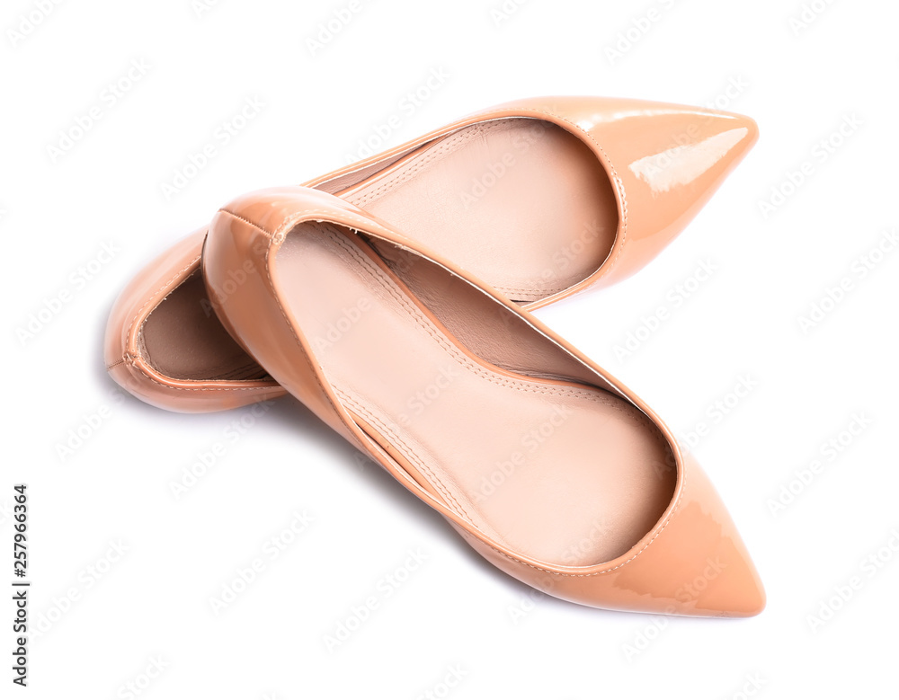 Stylish female flat shoes on white background, top view Stylish female flat shoes on white background, top view