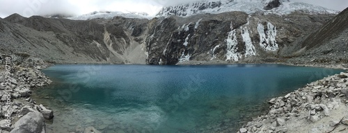 Lago 69/Lake 69, Huarez Peru. Beautifully blue water at the top of a mountain photo