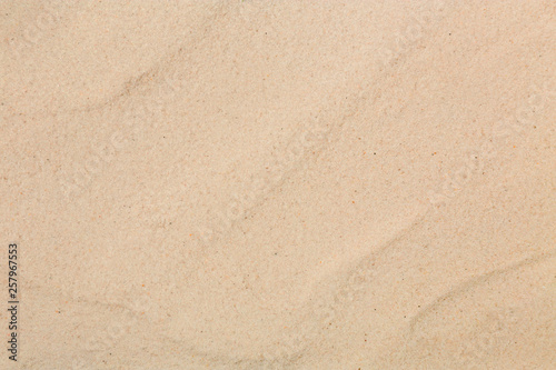 Dry beach sand as background, top view