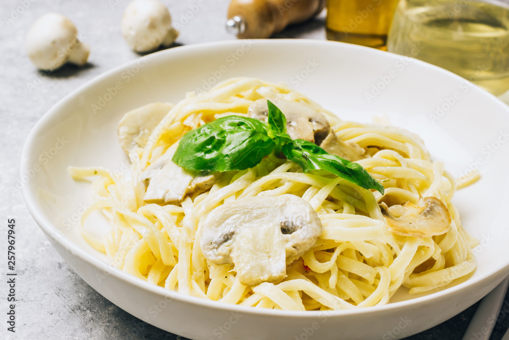 Pasta fettuccine with mushrooms and creamy cheese sauce