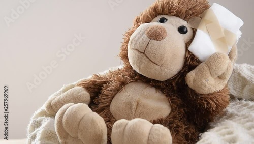 Teddy Bear toy wounded in the head. Accident, healthcare concept