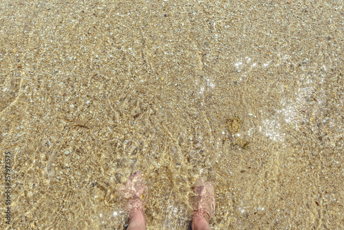 feet in the sand