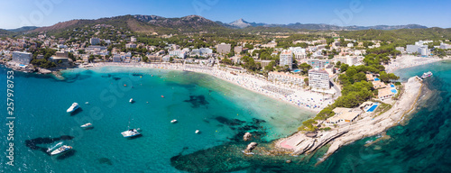 Spain, Balearic Islands, Mallorca, Region Calvia, Costa de la Calma, Peguera, Aerial view of beach with hotels, panorama photo