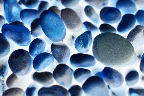Rounded pebbles on beach