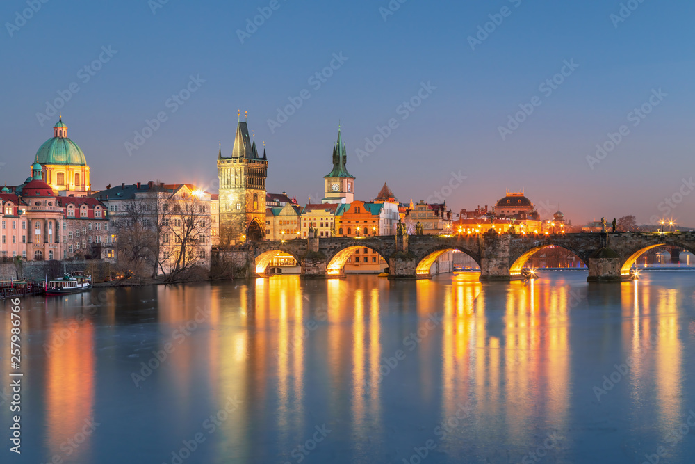 Scenic view Charles bridge and historical center of Prague, buildings and landmarks of old town at sunset, Prague, Czech Republic Scenic view Charles bridge and historical center of Prague, buildings and landmarks of old town at sunset, Prague, Czech Republic