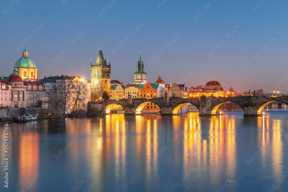 Scenic view Charles bridge and historical center of Prague, buildings and landmarks of old town at sunset, Prague, Czech Republic