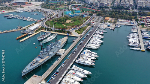 Aerial drone bird's eye view of small port and Park of Maritime Tradition where historic Averof warship is docked, Flisvos, Faliro Marina, Athens riviera, Attica, Greece © aerial-drone