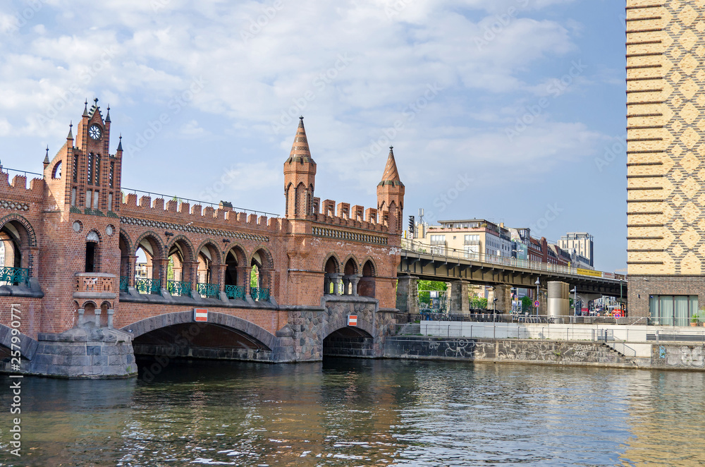 Banks of the river Spree with a part of the Brick Gothic Oberbaum Bridge