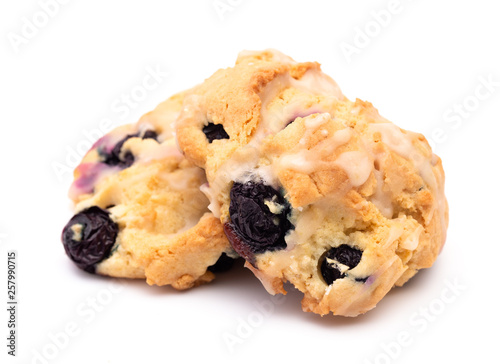 Tablou pe pânză Two Lemon and Blueberry Scones on a White Background