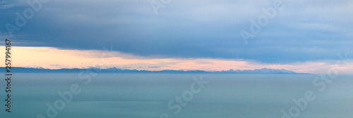 sea ocean and dark blue sky clouds