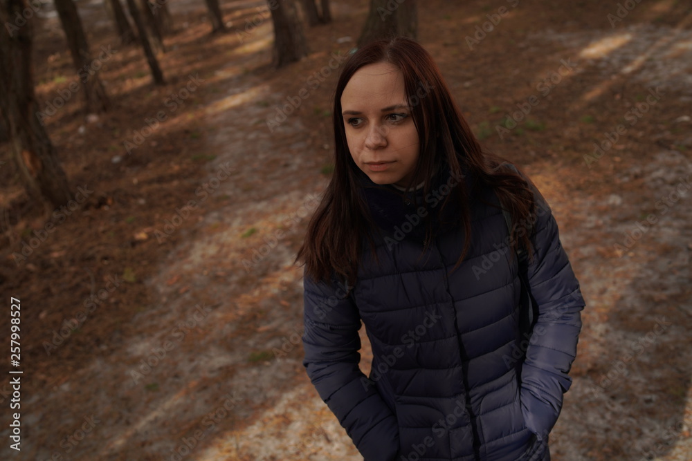 Girl walking in the woods. Traveler in nature. Girl walking in the woods. Traveler in nature.