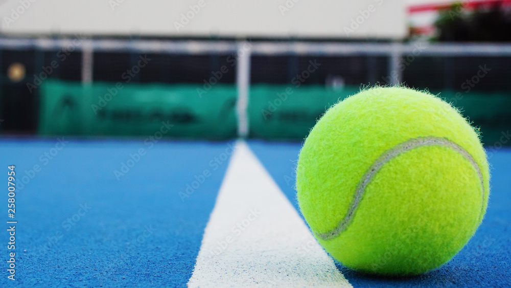 close up tennis ball in the tennis court