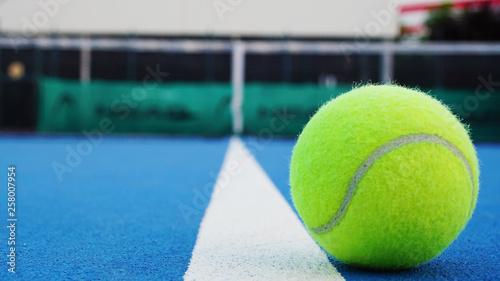 close up tennis ball in the tennis court © bilge