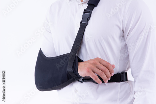 broken hand wearing an arm brace