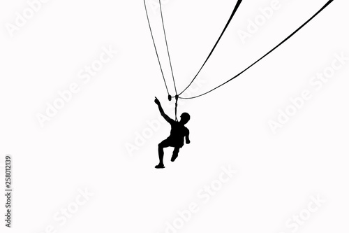 Silhouette men are playing zip line on white background.