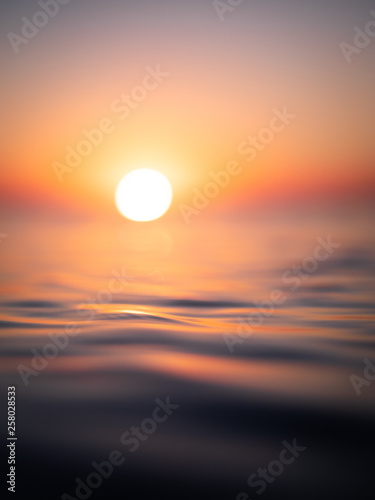 Fototapeta Naklejka Na Ścianę i Meble -  Sun Setting on Water