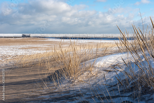 frozen beach along Lake Michigan shoreline in winter