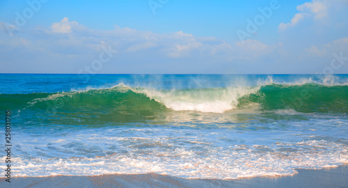 Powerful turquoise sea wave