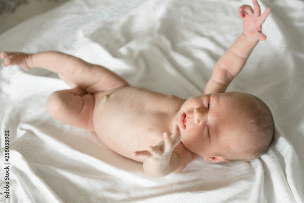 Newborn naked Baby girl on white background Newborn naked Baby girl on white background