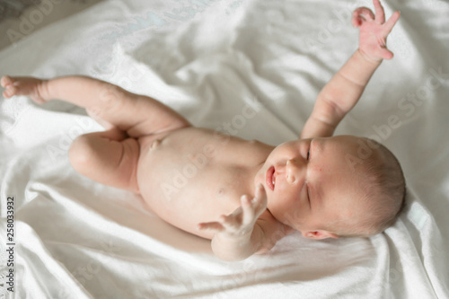 Newborn naked Baby girl on white background
