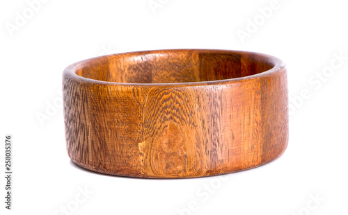 Wooden bowl. An isolated on white background