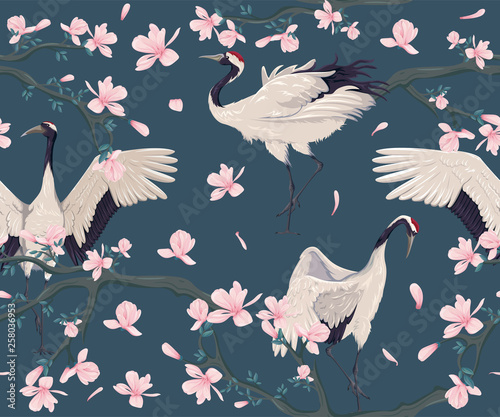 Seamless pattern with japanese cranes and blooming magnolia