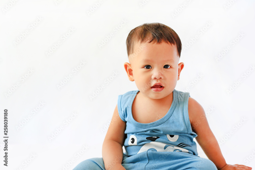 Baby boy portrait looking at camera over white background. Baby boy portrait looking at camera over white background.