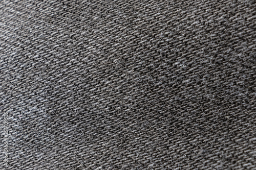 Denim texture closeup, macro. The image is suitable as a background for various tasks.