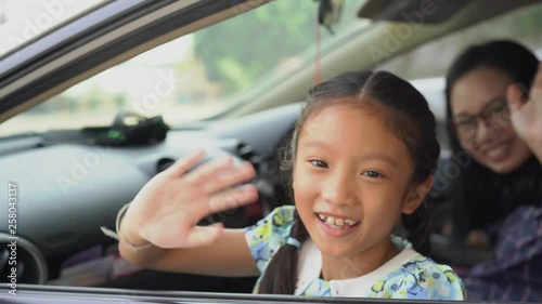 Family happy opening car window waving hand and enjoy travel, 4K