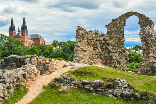 Old stone ruins of an ancient church. Latvian landscape