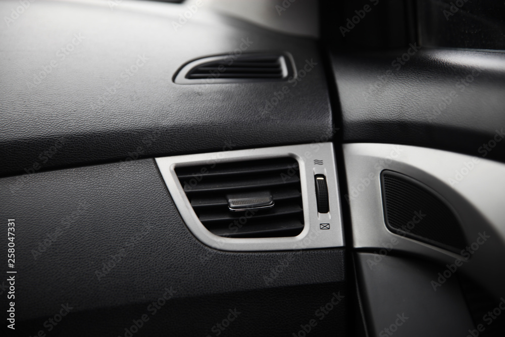 Close up of inside modern car door opener 