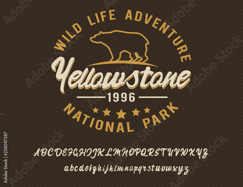 Wild life adventure. Yellowstone national park. Retro style. Handmade script font. Hipster style. Camping logo. Retro and vintage hadmade logo. Print on clothes, sticker.