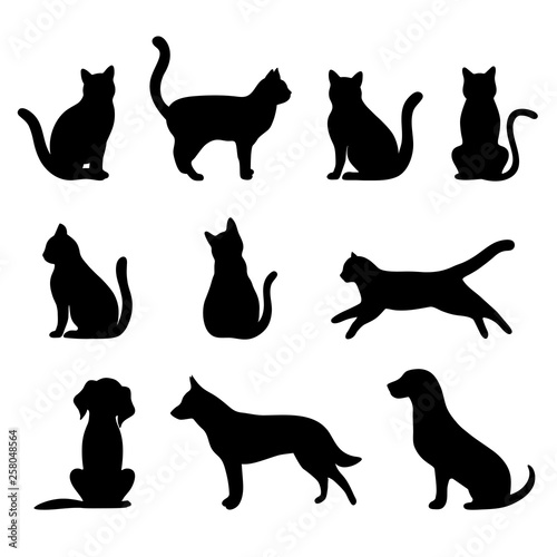set of silhouettes of dogs and cats on a white background