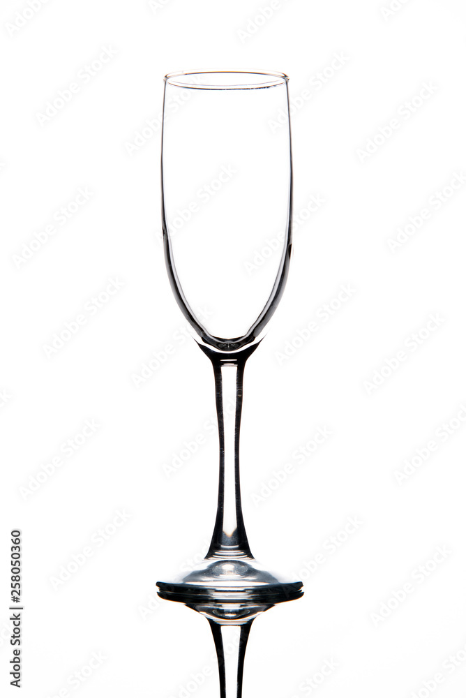 The silhouette of a champagne glass on white background.