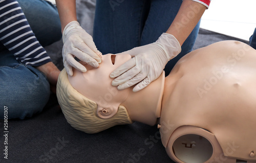 People learning to perform CPR at first aid training course © Pixel-Shot