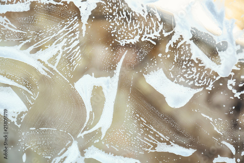 White soap suds and foam on...