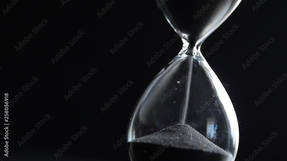 Hourglass on dark background
