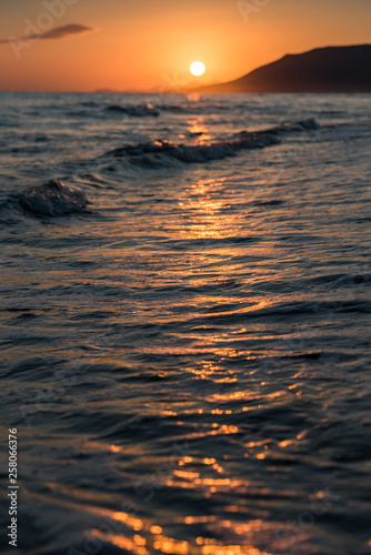 Orange sunrise over sea © Jaroslav