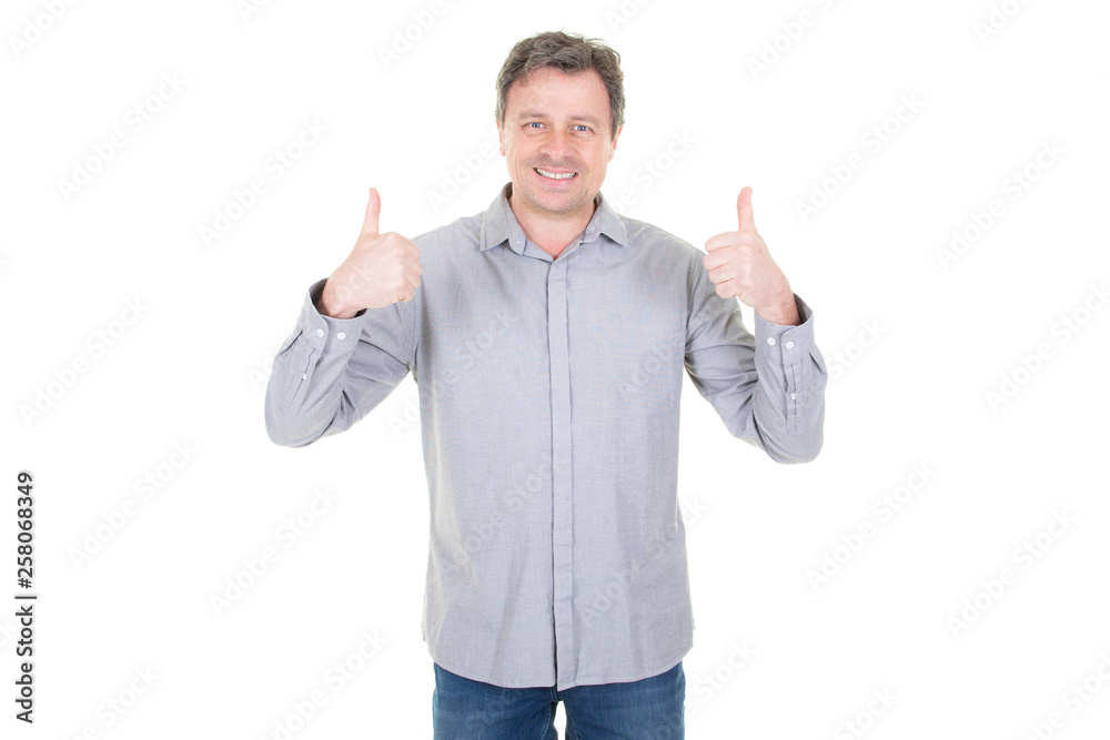 Handsome man with both two thumbs up in white background Handsome man with both two thumbs up in white background